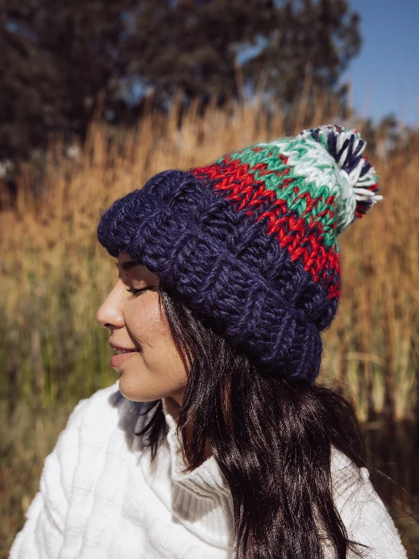 Leather trucker cap for edgy rugged appeal -Free People Tide Stripe Knit Pom Beanie - Navy