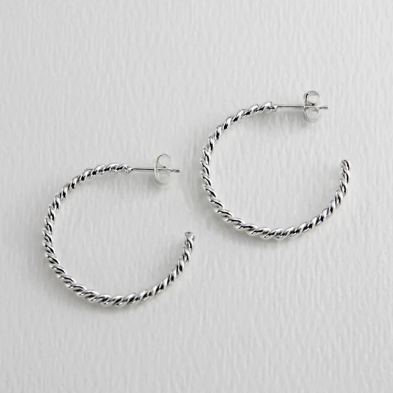 Hoop earrings with open designs for a modern, lighthearted vibe-Twisted 24mm Sterling Silver Hoop Earrings