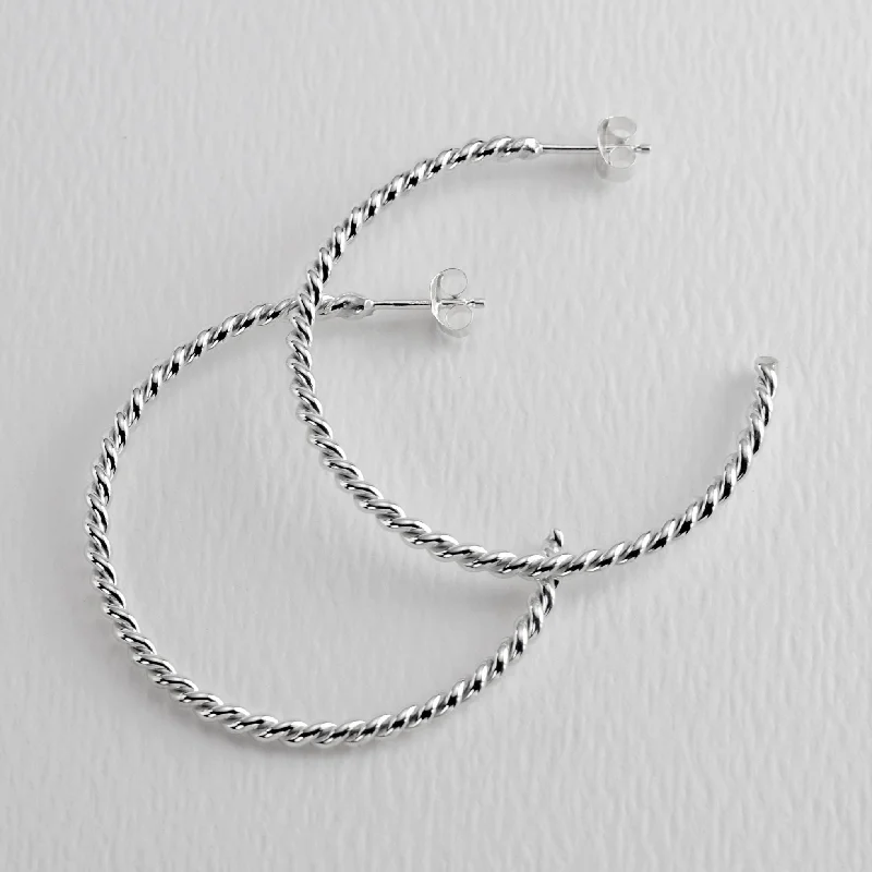 Hoop earrings with dangling charms for a playful and fun look-Twisted 40mm Sterling Silver Hoop Earrings