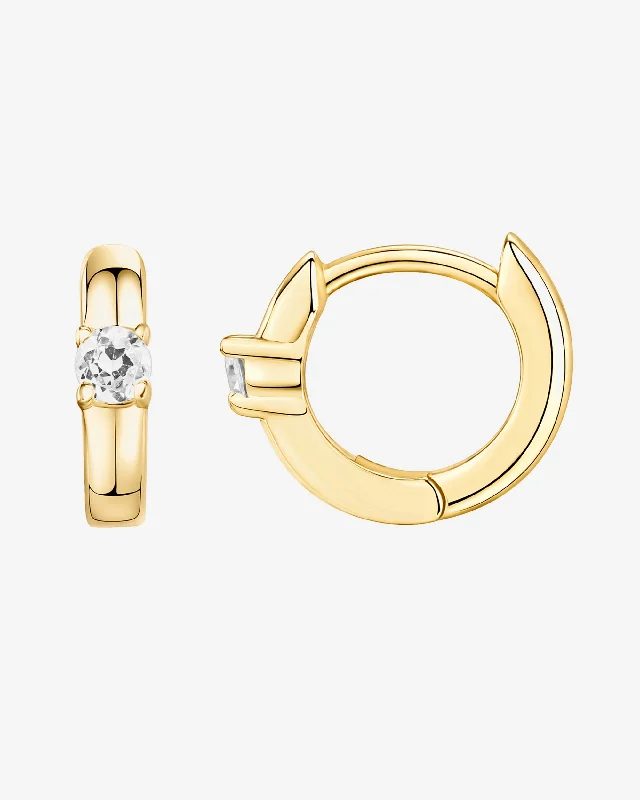 Hoop earrings with rhinestone-studded rims for a glamorous touch-Solitaire Huggies